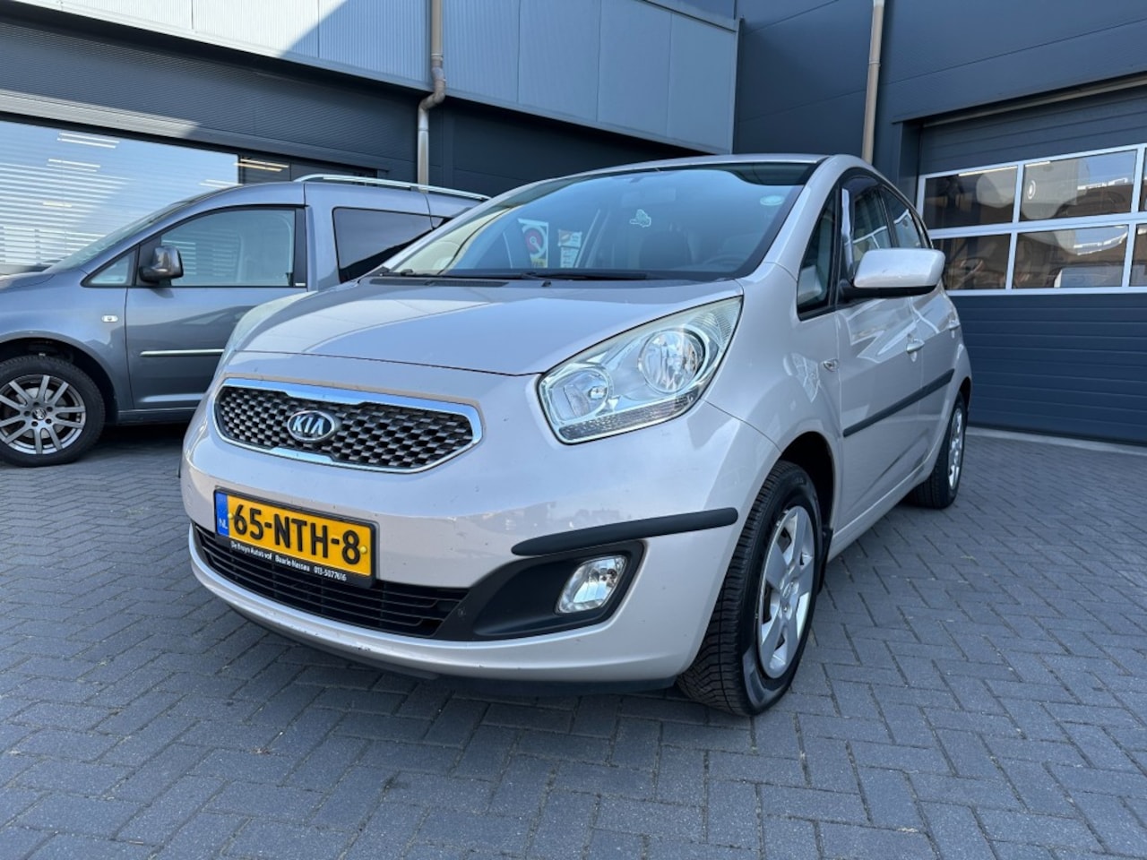 Kia Venga - 1.4 met airco, cruise control, PDC achter, APK 05-2027 - AutoWereld.nl