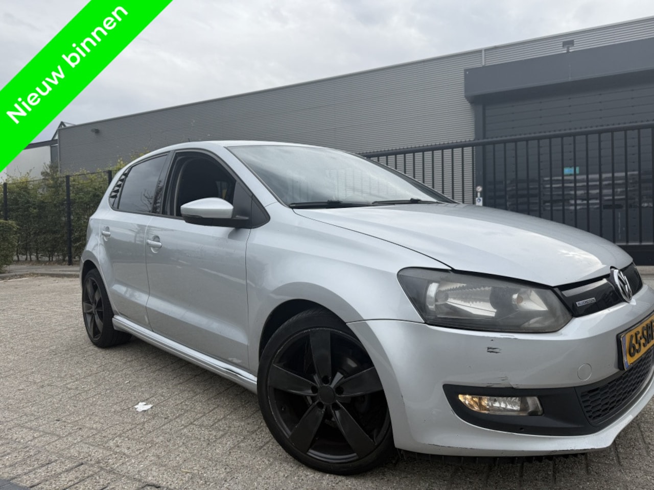 Volkswagen Polo - 1.2 TDI Cruisecontrol Clima Bleutooth Navigatie - AutoWereld.nl