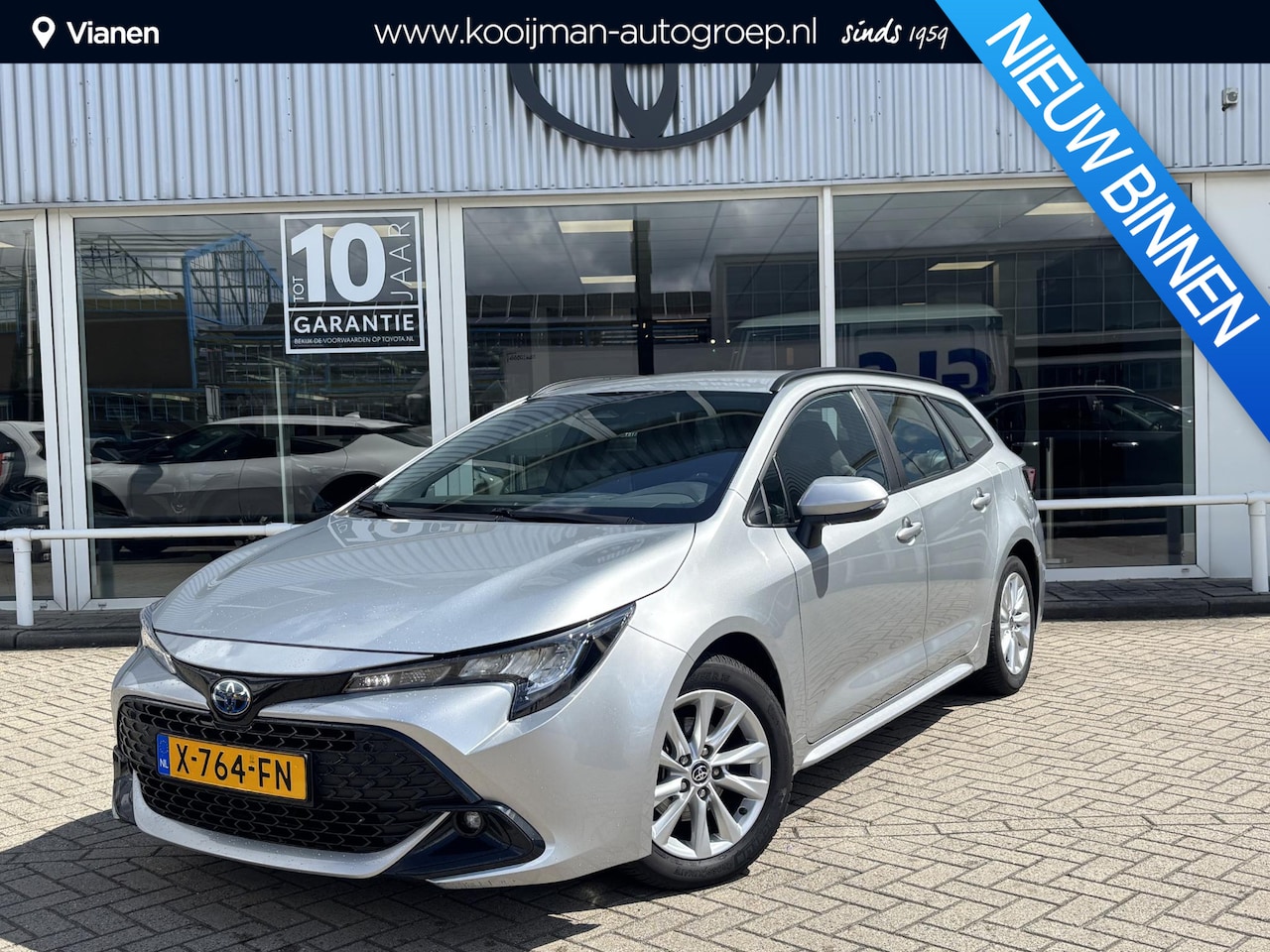 Toyota Corolla Touring Sports - Hybrid 140 Active - AutoWereld.nl