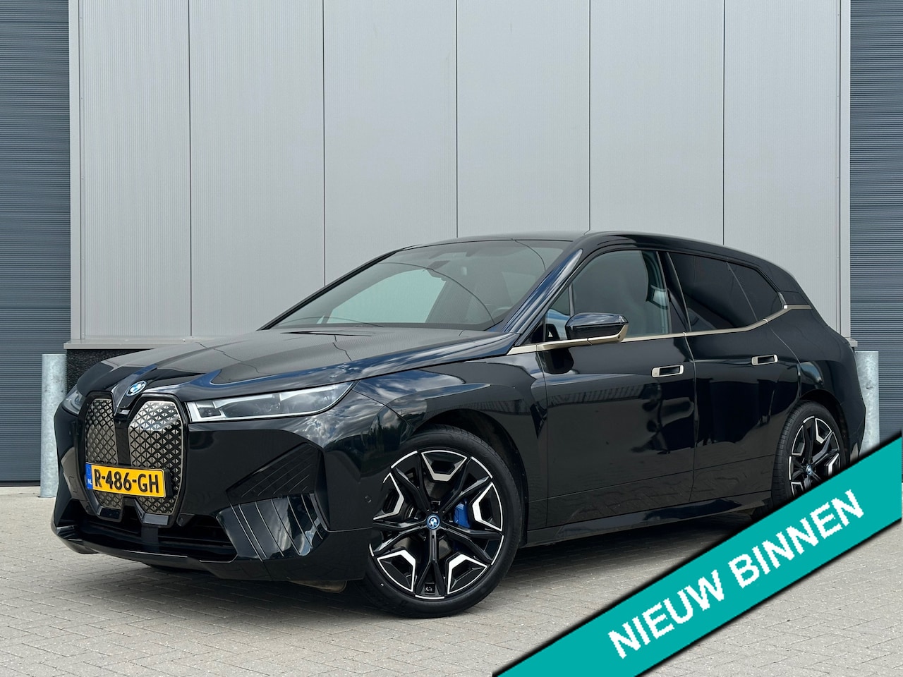 BMW iX - XDrive40 Executive 77 kWh |100% SOH|LASER|PANO|GOLD| - AutoWereld.nl
