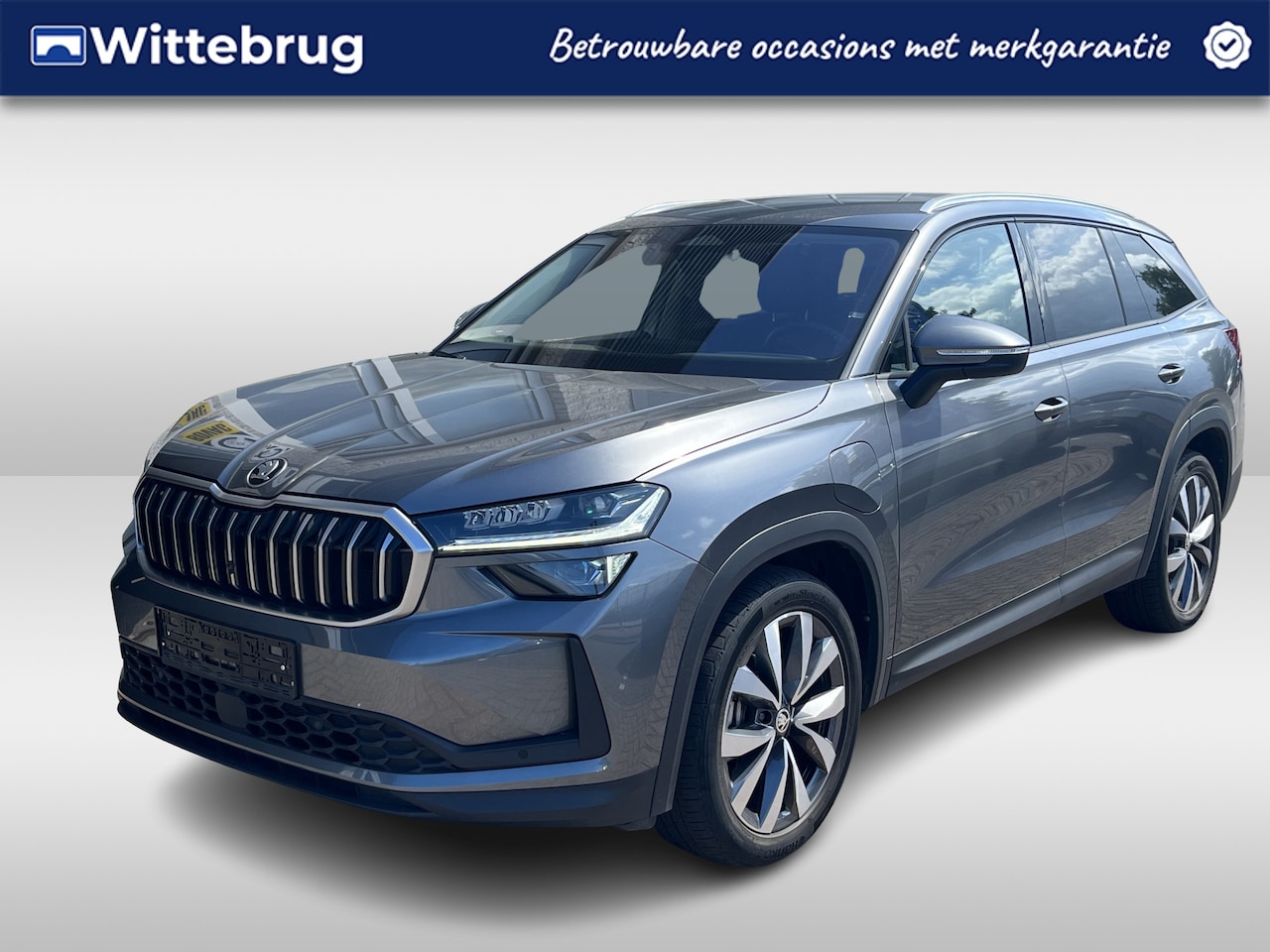 Skoda Kodiaq - 1.5 TSI PHEV Selection / GARANTIE TM 03-2028/ AUTOMAAT/ LEER/ TREKHAAK/ PARK.SENSOR.V+A/ C - AutoWereld.nl