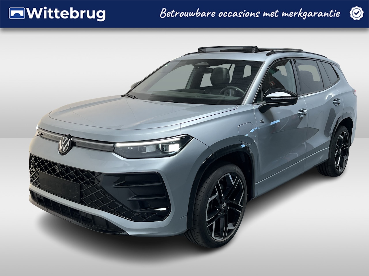 Volkswagen Tayron - 1.5 eHybrid R-Line / GARANTIE TM 12-2030/ AUTOMAAT/ PANO/ LEER/ TREKHAAK/ 272 PK/ PARK.SEN - AutoWereld.nl