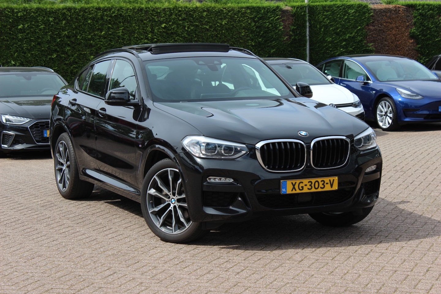 BMW X4 - xDrive20i High Exe. M Sport / Panoramadak / 360Camera / Leder / 20'' / Harman Kardon / Nav - AutoWereld.nl