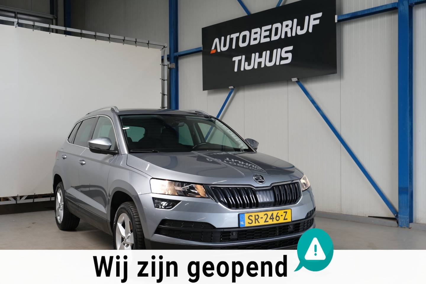 Skoda Karoq - 1.5 TSI ACT Ambition Business Automaat - N.A.P. Airco, Cruise, Navi, PDC, Carplay, Trekhaa - AutoWereld.nl