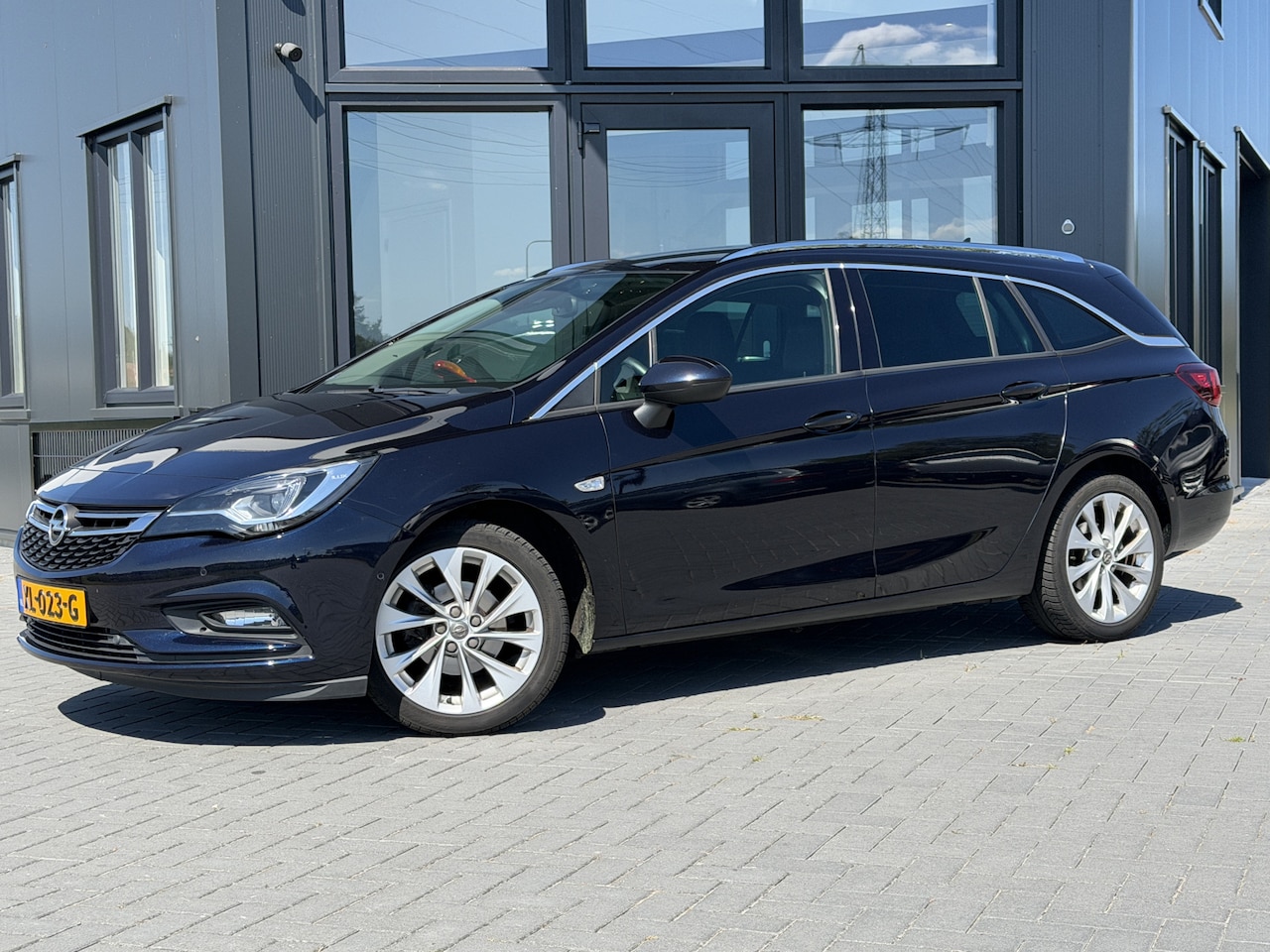 Opel Astra Sports Tourer - 1.4 Innovation Leer | Adap. cruise | Trekhaak | Verw. stoel & stuur - AutoWereld.nl