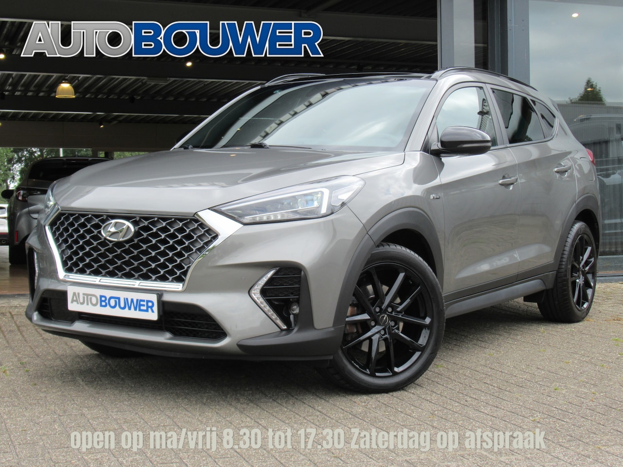 Hyundai Tucson - 1.6 T-GDI 177 PK 4WD N-Line 2e eigen | dealer onderh | panodak | full option! - AutoWereld.nl
