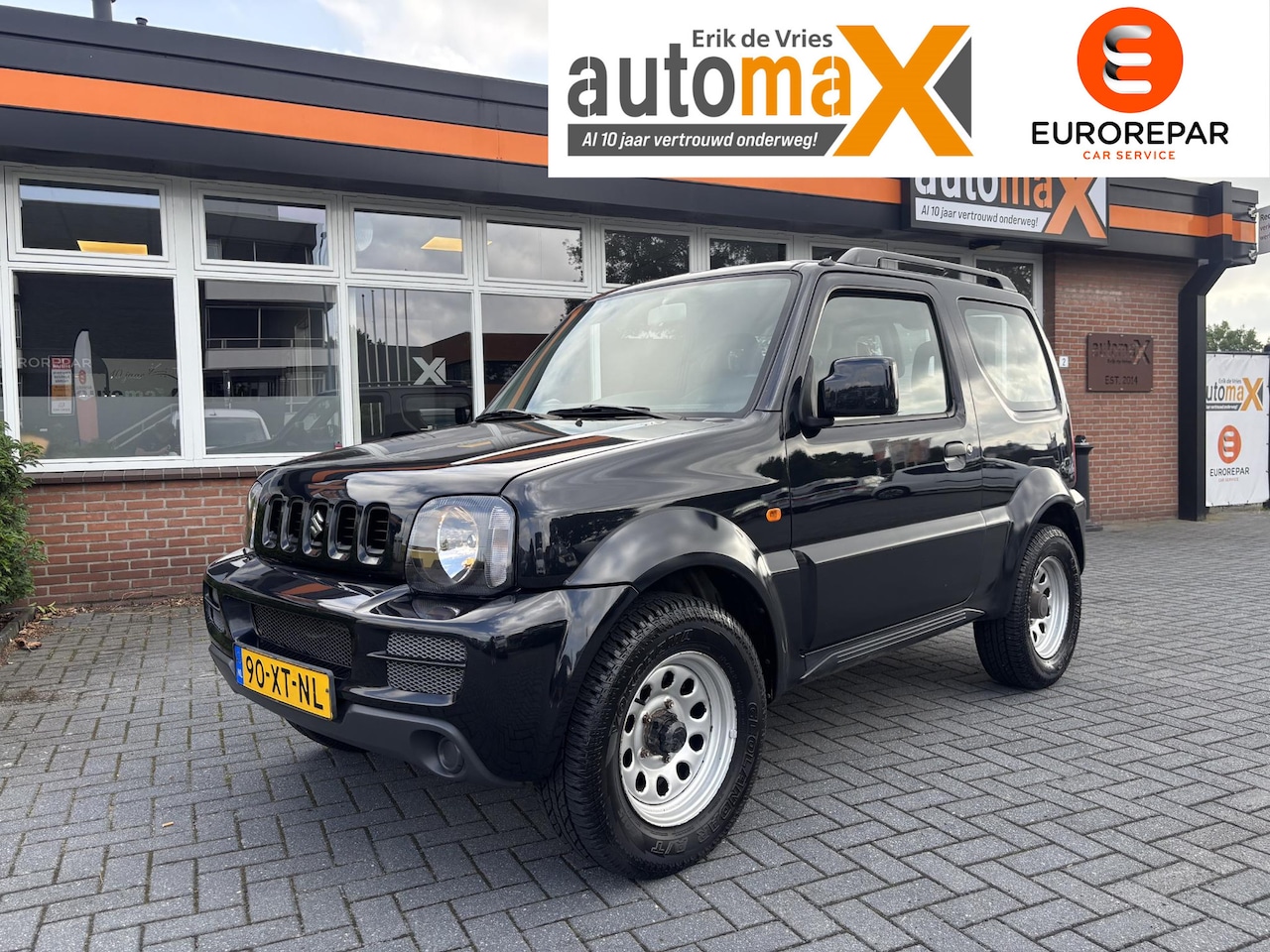 Suzuki Jimny - 1.3 JLX |4WD| - AutoWereld.nl