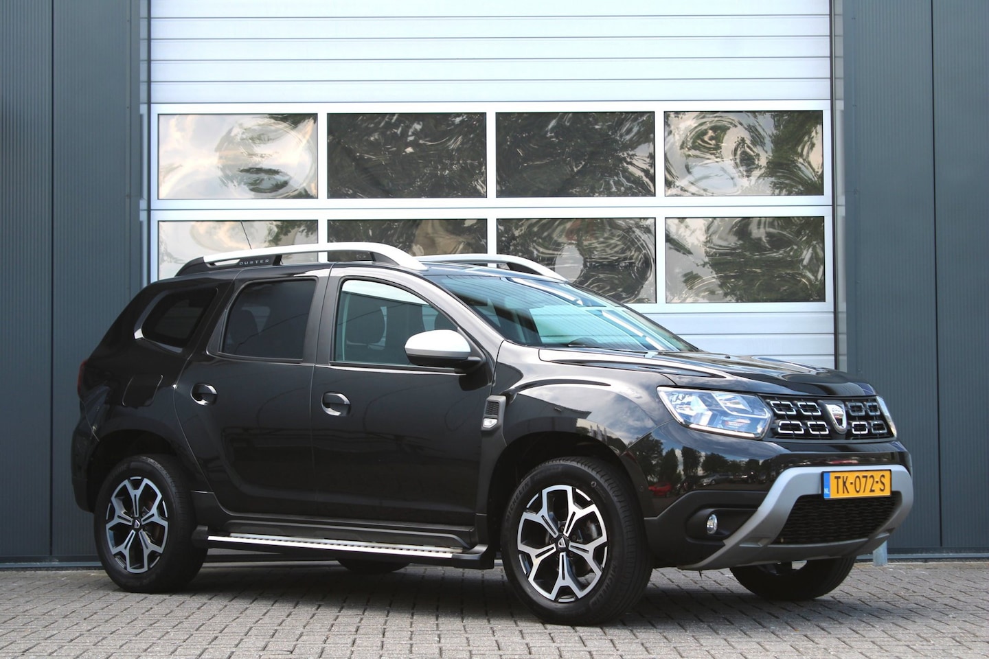 Dacia Duster - 1.2 TCe Prestige Clima/Cruise/Camera/PDC/Dodehoek/Navi/Bluetooth/LED/17"LM/DABRadio.AUX.US - AutoWereld.nl