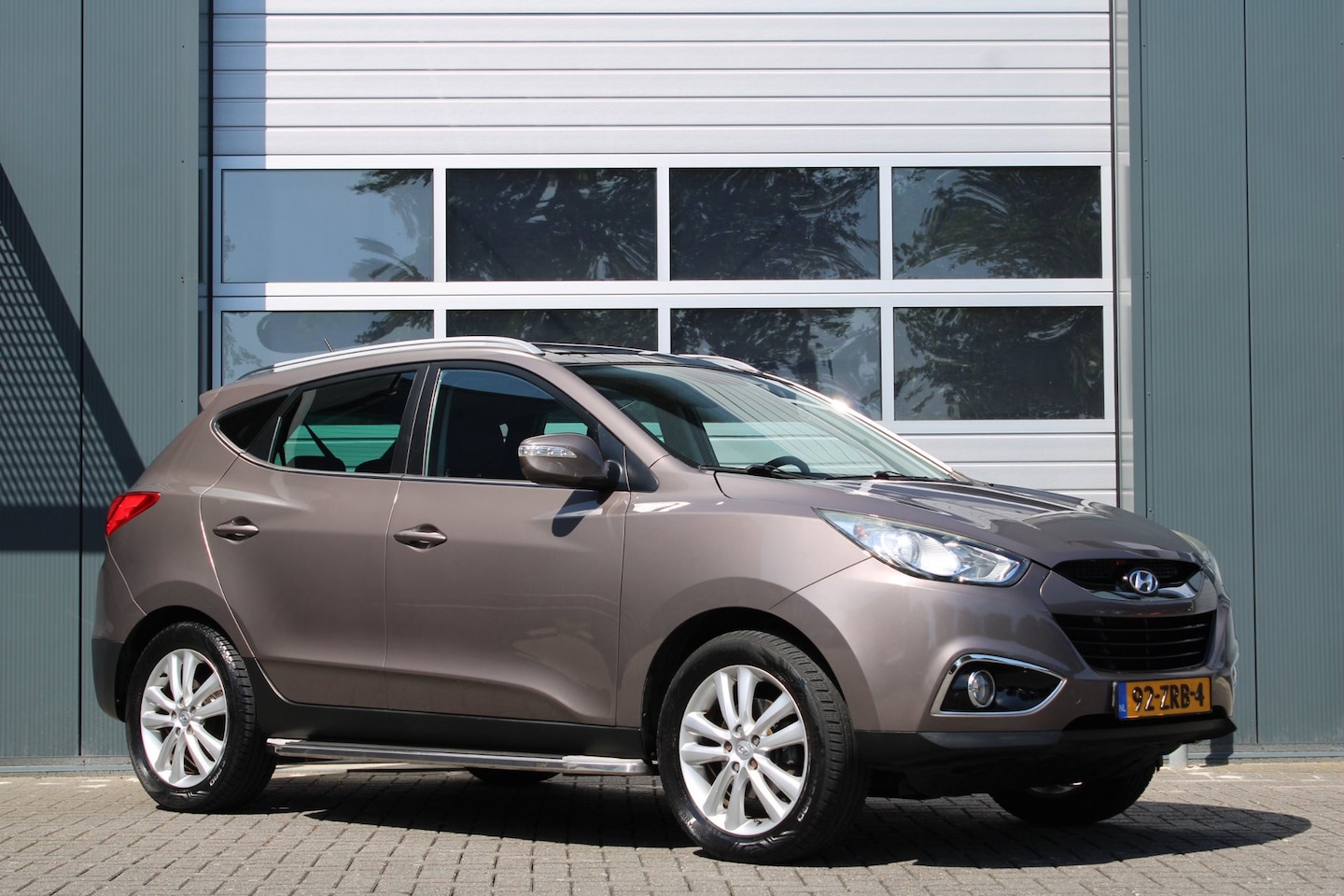 Hyundai ix35 - 1.6i GDI i-Catcher Clima/Cruise/Camera/Panodak/Keyless/Stoelverwarming/Leder/Navi/Bluetoot - AutoWereld.nl
