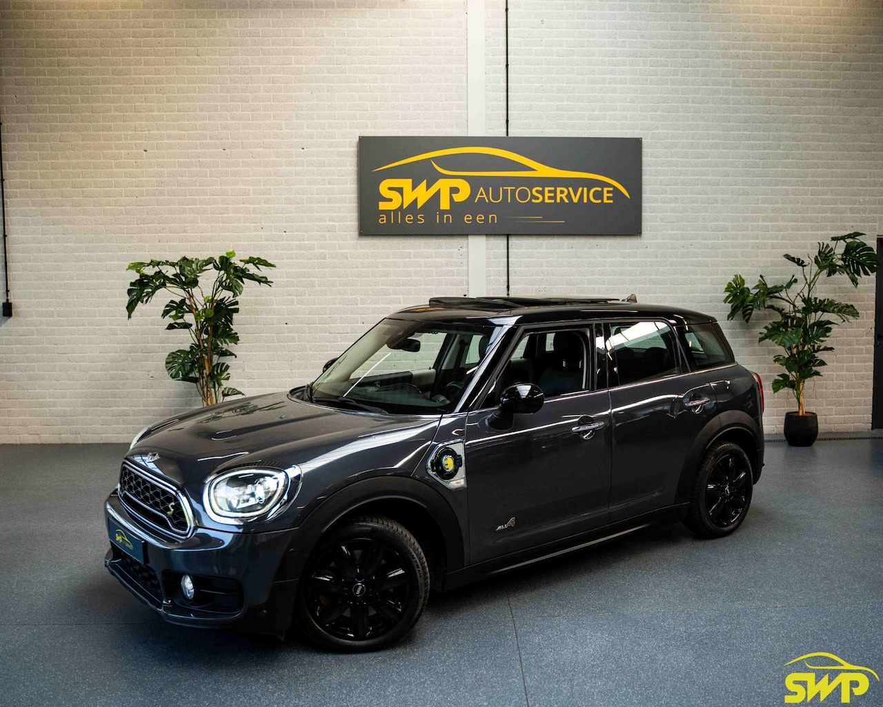 MINI Countryman - 1.5 Cooper S E ALL4 Chili | Leer | Pano | Camera | Navigatie - AutoWereld.nl