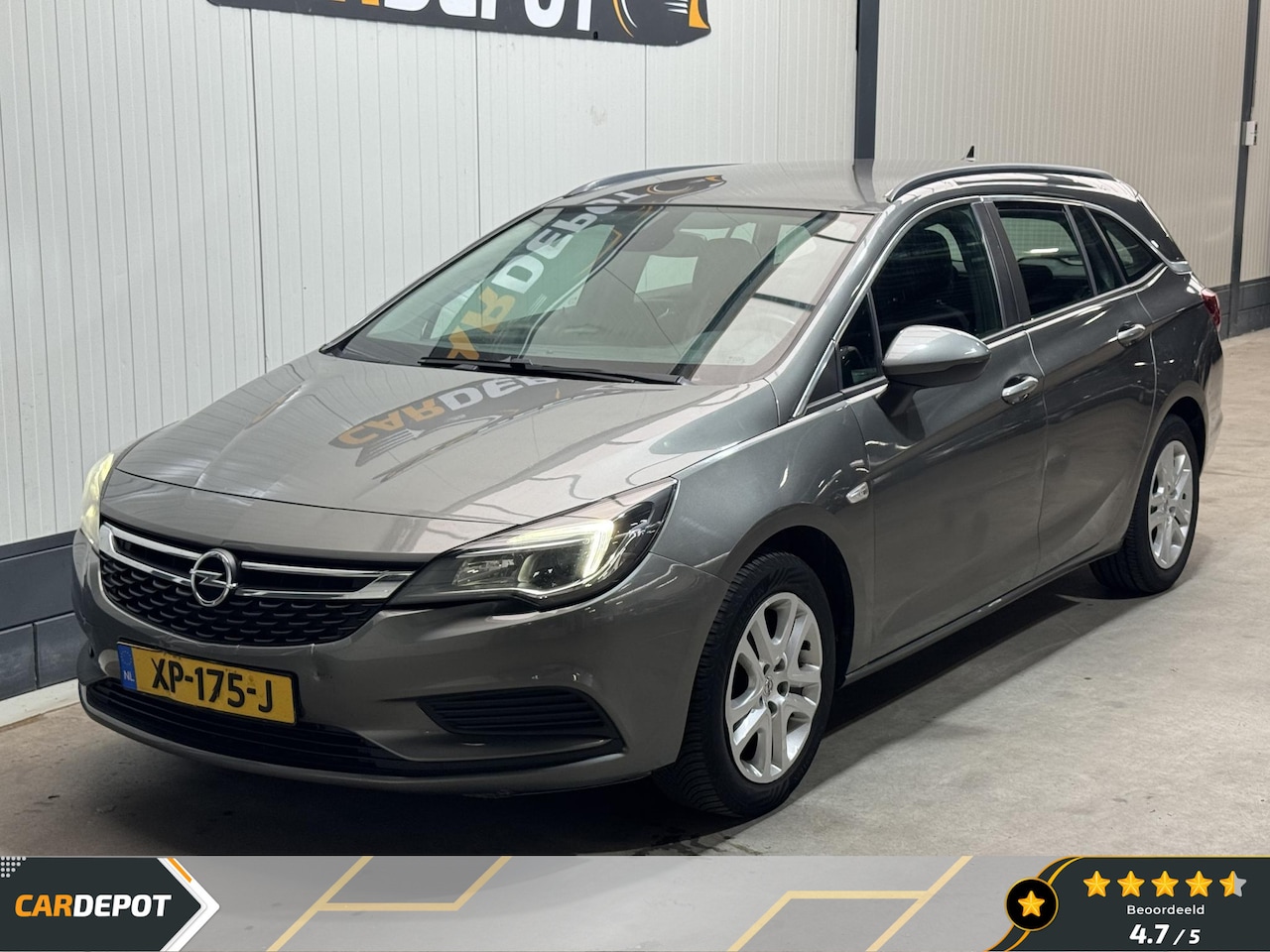 Opel Astra Sports Tourer - 1.6 CDTI Business 1.6 CDTI Business+ - AutoWereld.nl