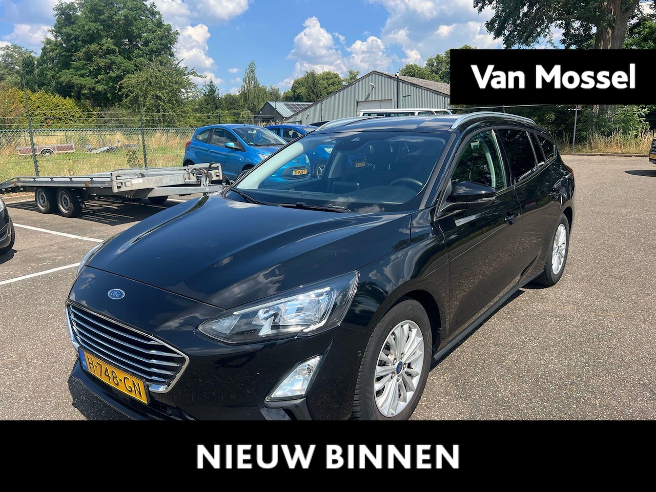 Ford Focus Wagon - 1.0 EcoBoost Titanium Business | Adaptieve Cruise Control | Stoel/stuur voorruitverwarming - AutoWereld.nl