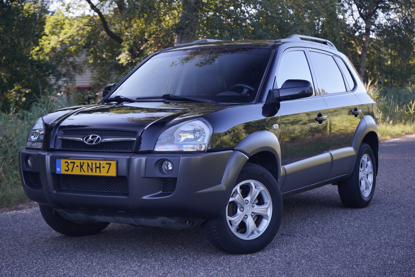 Hyundai Tucson - 2.0i Active 2.0i Active, Leer, Camera, Trekhaak, NAP - AutoWereld.nl