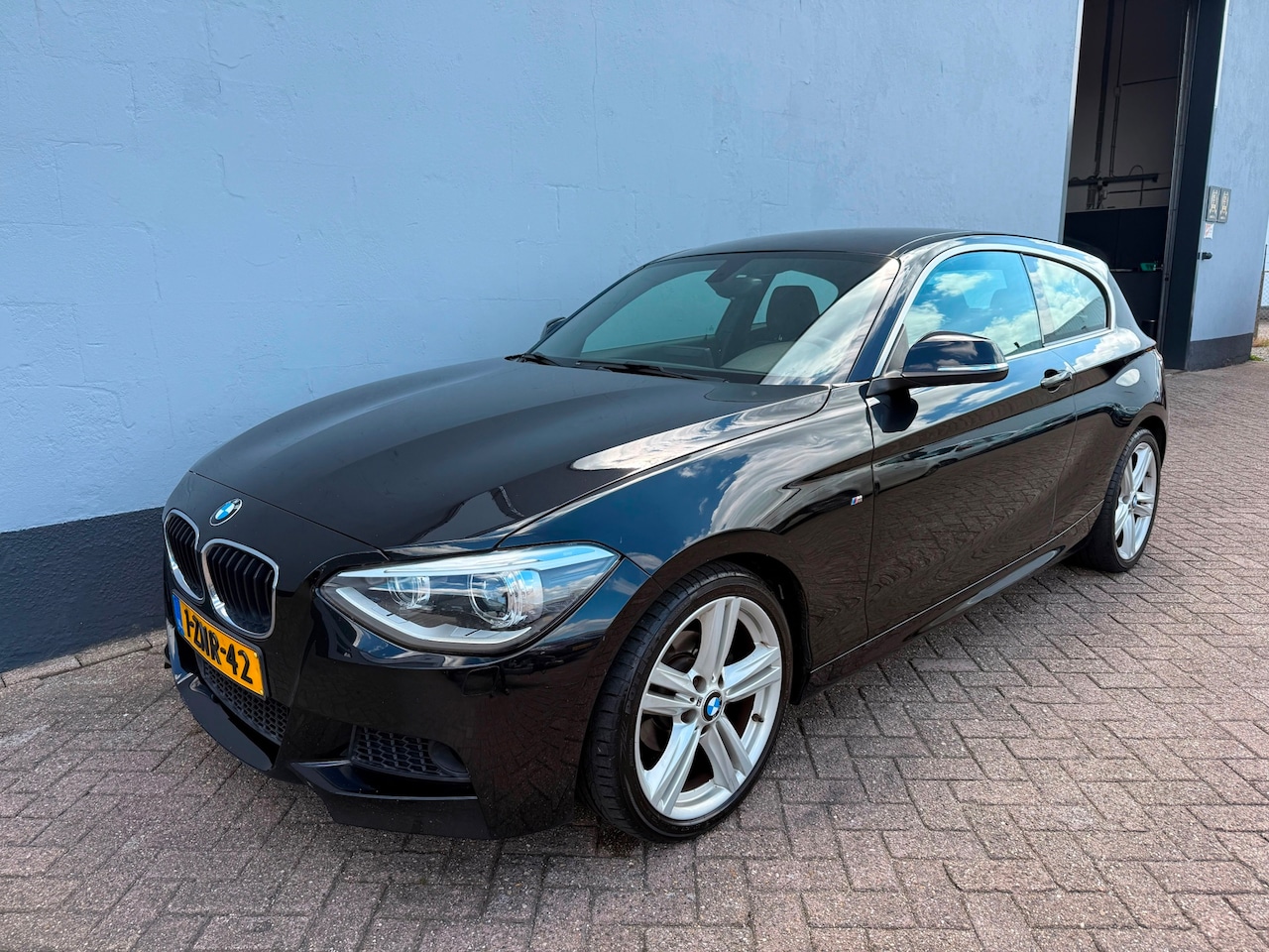 BMW 1-serie - 116i High Executive - Navigatie - AutoWereld.nl