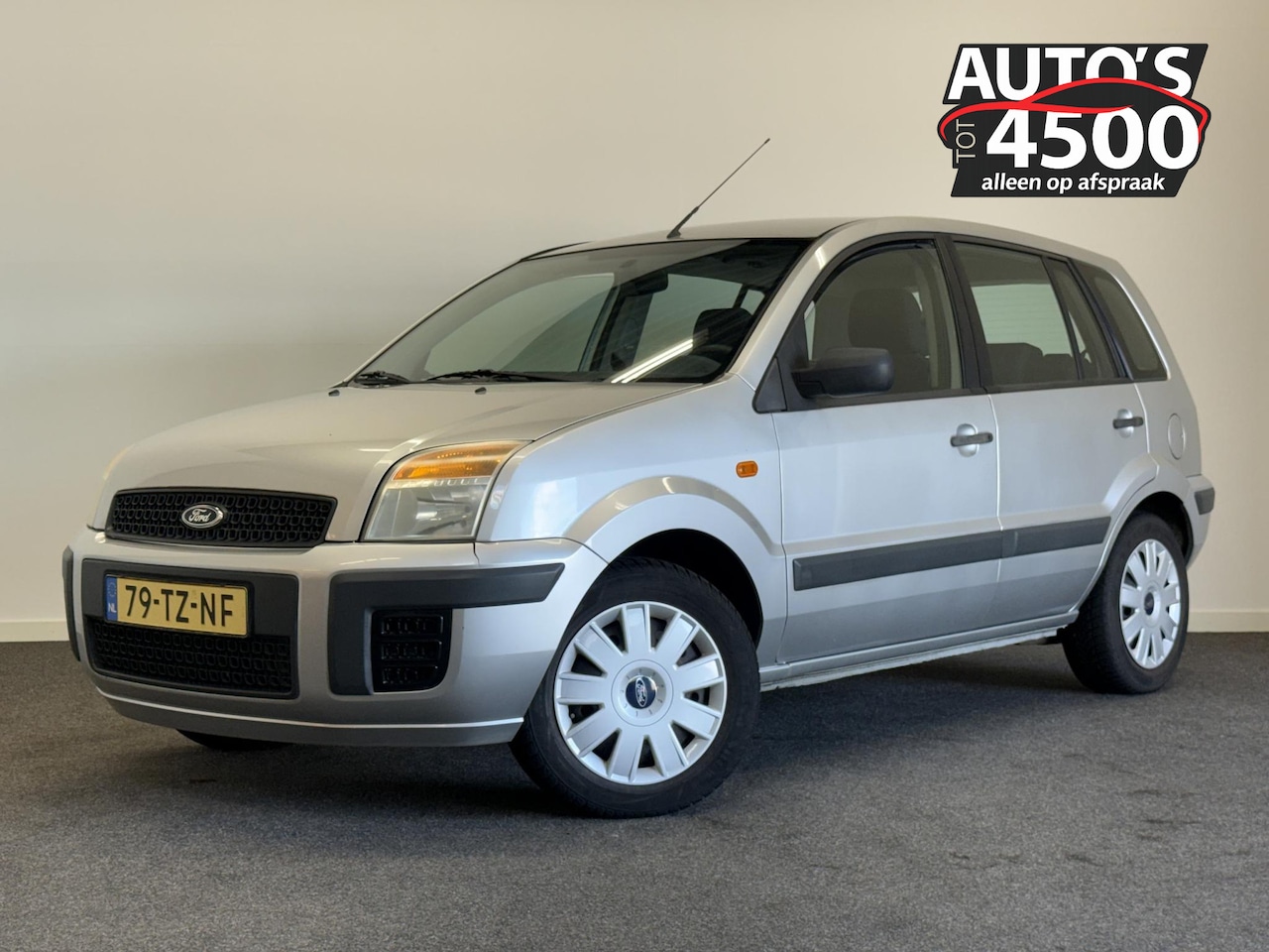 Ford Fusion - 1.4-16V Champion NAP! Airco! - AutoWereld.nl