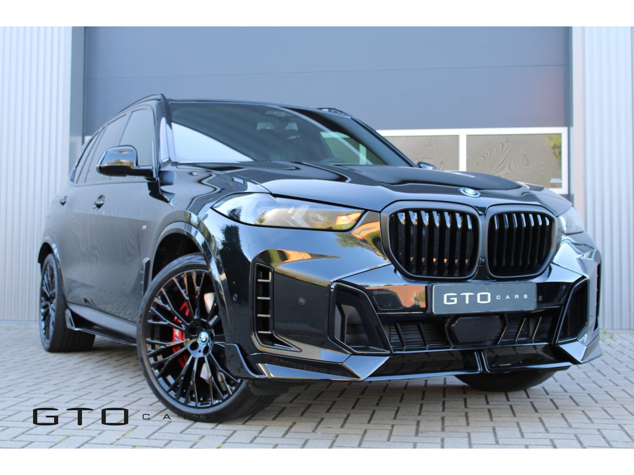 BMW X5 - xDrive50e M Performance/Individual Leder/22''/M Sport/Harman Kardon/Massage/ Surround Came - AutoWereld.nl