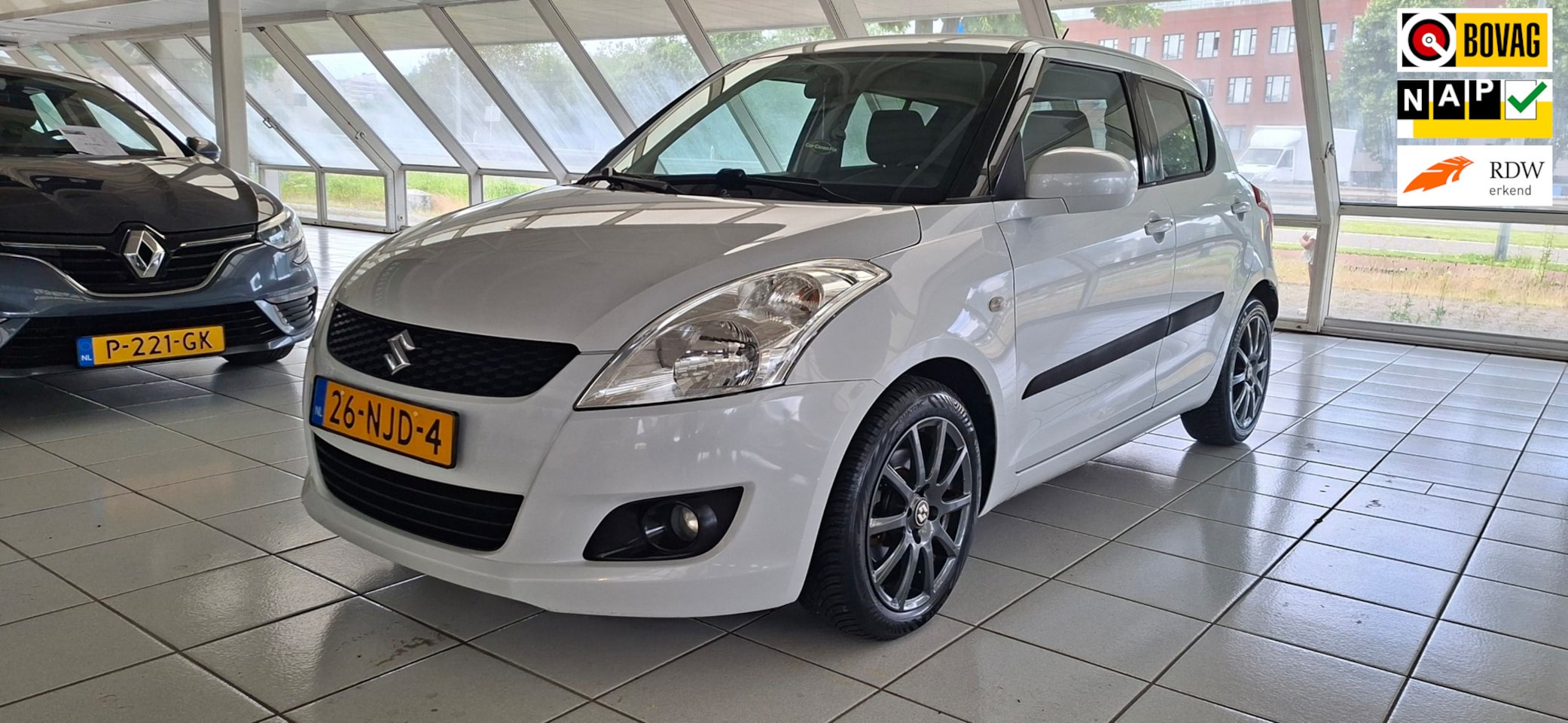 Suzuki Swift - 1.2 Exclusive automaat, luxe uitvoering met ecc/cruise/bluetooth - AutoWereld.nl