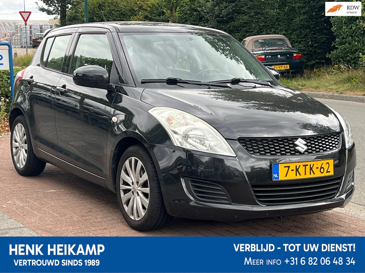 Suzuki Swift - 1.2 Business Black *Airco |Navi|LMV - AutoWereld.nl