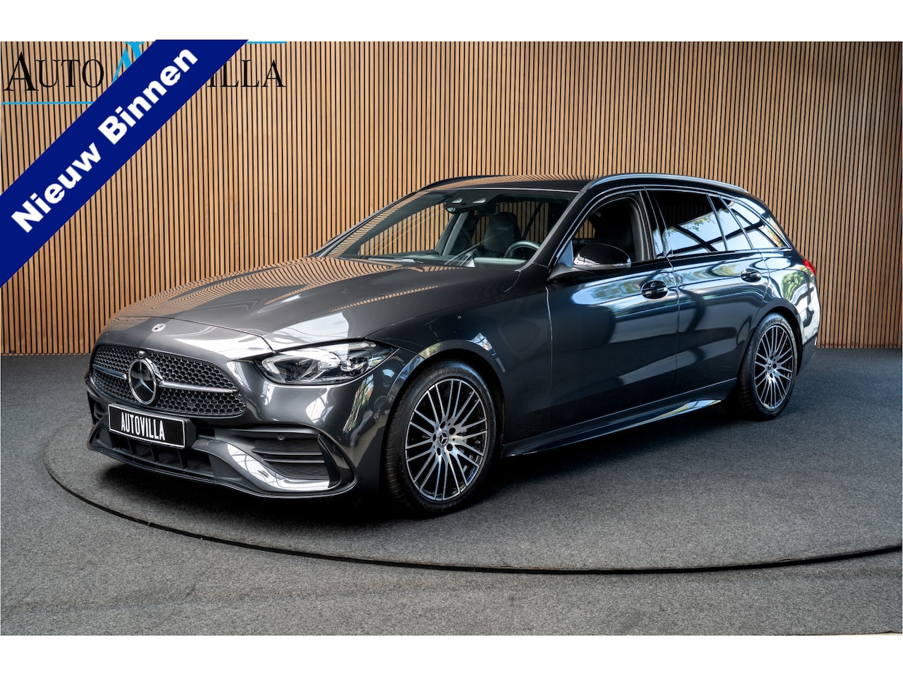 Mercedes-Benz C-klasse Estate - 180 AMG Line Leer Camera Navi LED Nightpack PTS Ambient Elekt. achterklep Elektr. trekhaak - AutoWereld.nl