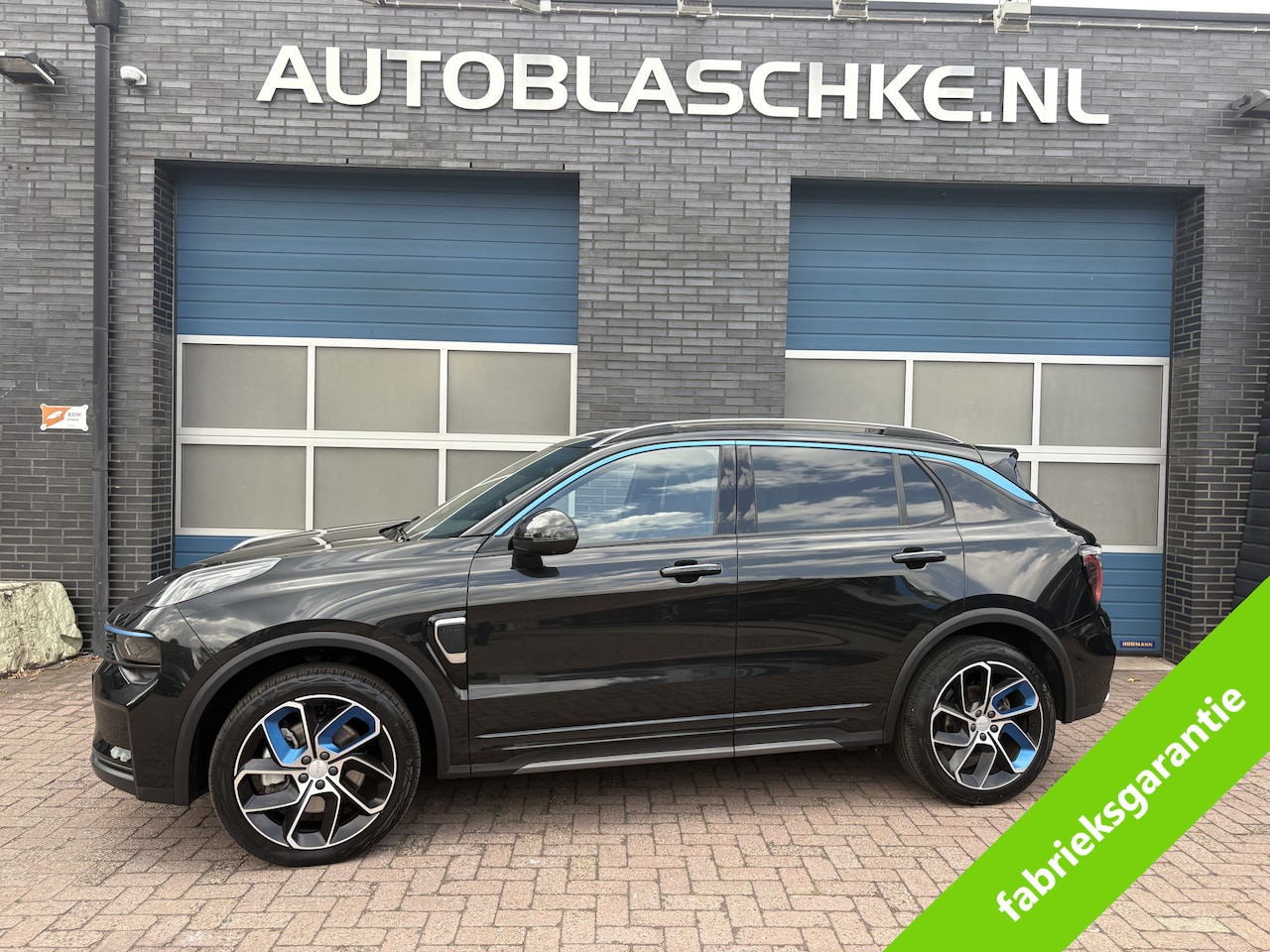 Lynk & Co 01 - 1.5 plug in hybrid, 261 pk, trekhaak, panodak - AutoWereld.nl