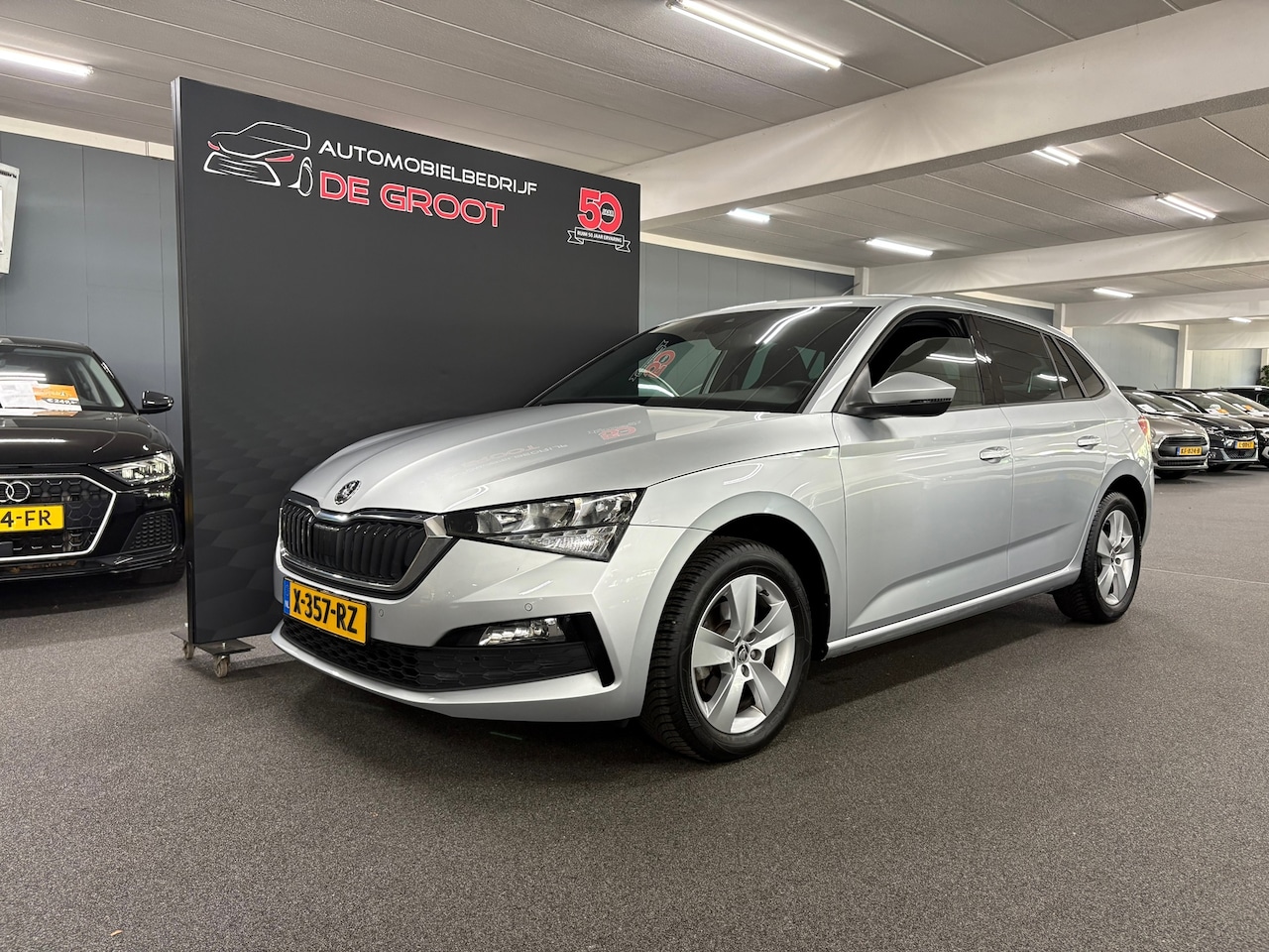 Skoda Scala - 1.0 TSI Sport Business/ NL auto/ Eerste eigenaar/ Parkeersensoren - AutoWereld.nl