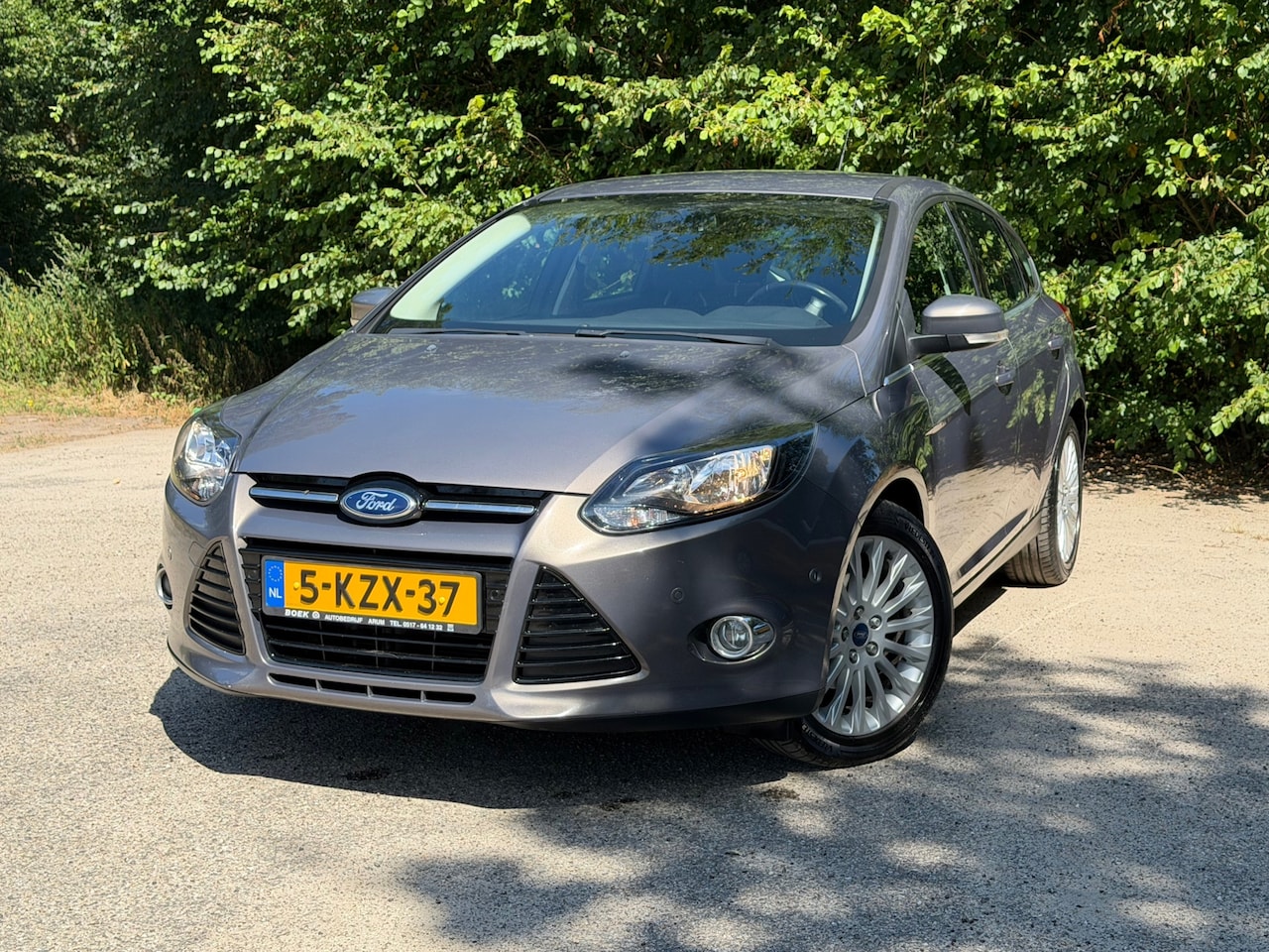Ford Focus - 1.0 EcoBoost Titanium | Cruise control + Navi Nu € 3.950,- !!! - AutoWereld.nl