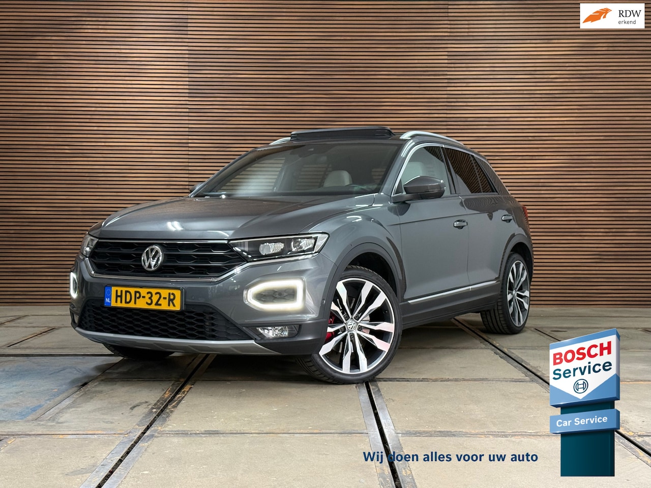 Volkswagen T-Roc - 2.0 TSI 4Motion Sport | Pano | Virtual |19 INCH | Leder | ACC | Beats Audio | Winterpakket - AutoWereld.nl