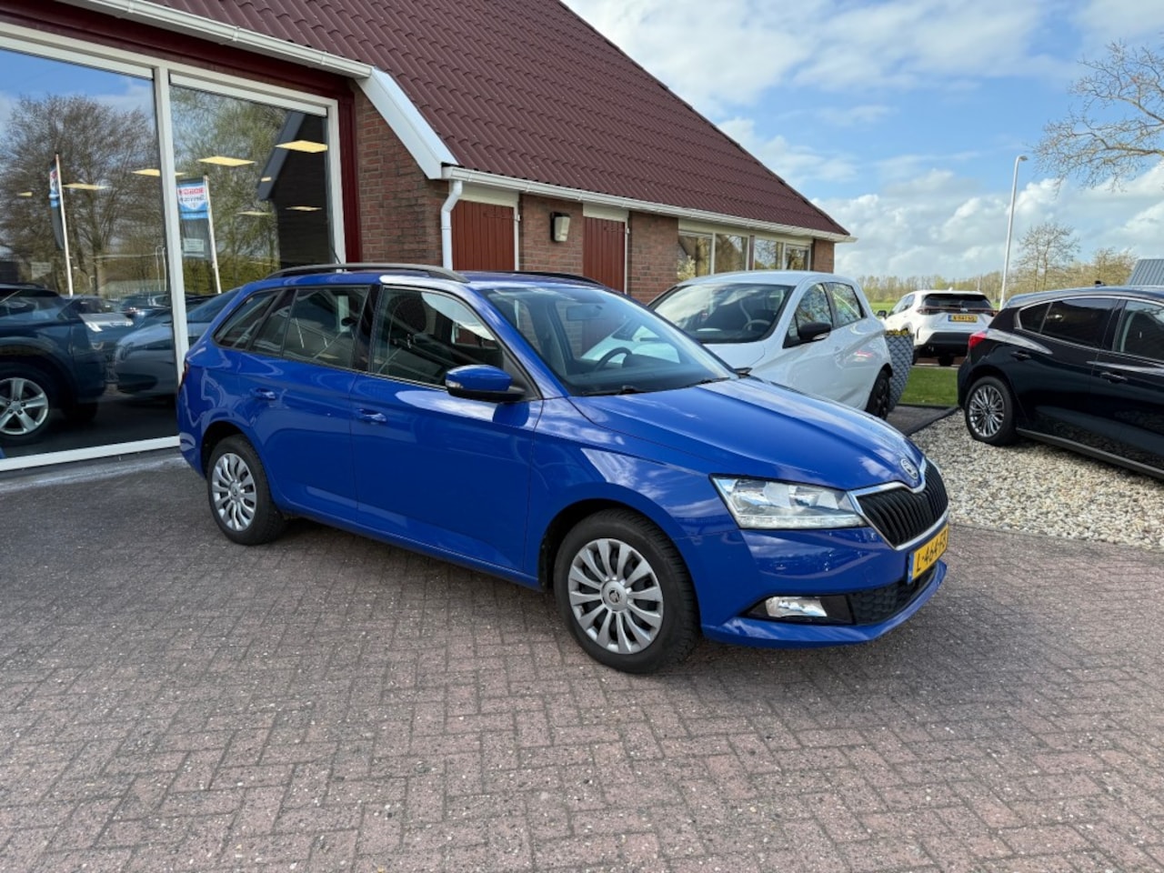 Skoda Fabia Combi - 1.0 TSI AMBITION STATIONWAGON Orig. NL/NAVI/AIRCO/CRUISE CONTROL - AutoWereld.nl