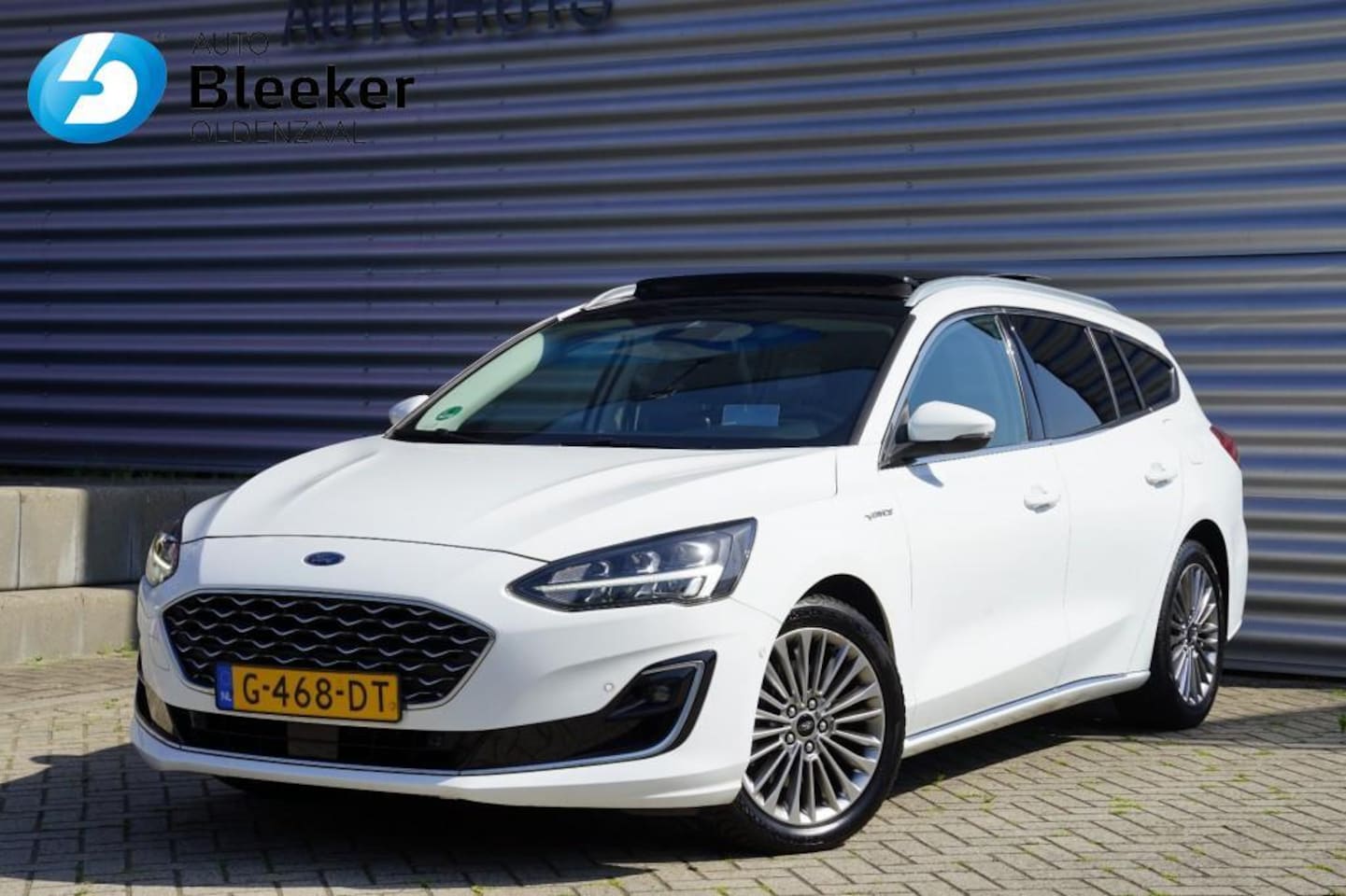 Ford Focus Wagon - 1.0 125PK Vignale Ecc Adapt.Cruise Pano Leer HUD Navi PDC Sync - AutoWereld.nl