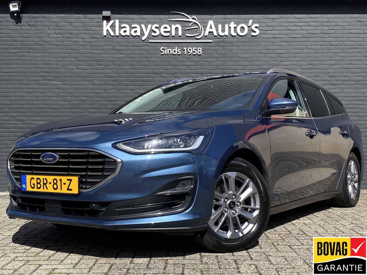 Ford Focus Wagon - 1.0 EcoBoost Hybrid 155 pk Titanium AUT. | 1e eigenaar | dealer onderh. | navigatie | crui - AutoWereld.nl