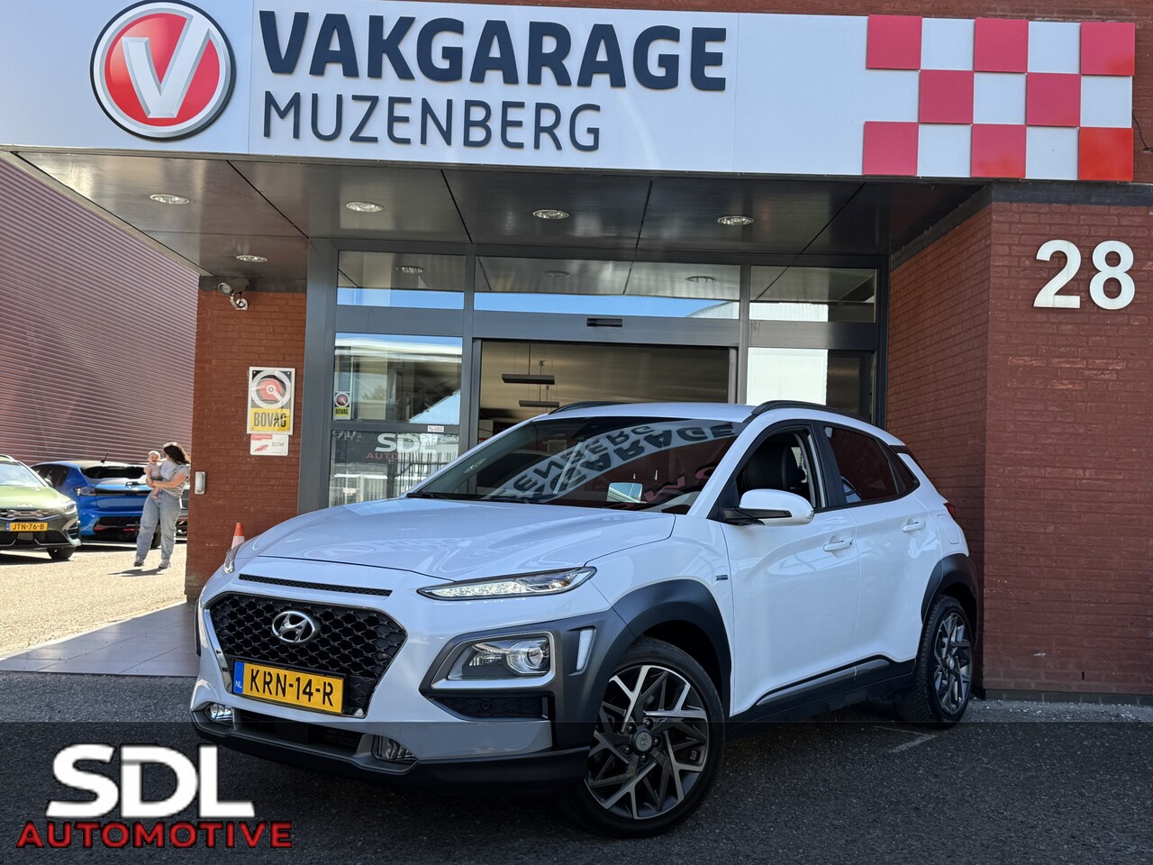 Hyundai Kona - 1.6 GDI HEV Premium // FULL LED // NAVI + CARPLAY // ELEK. STOELEN // KEYLESS // ADAPTIVE - AutoWereld.nl