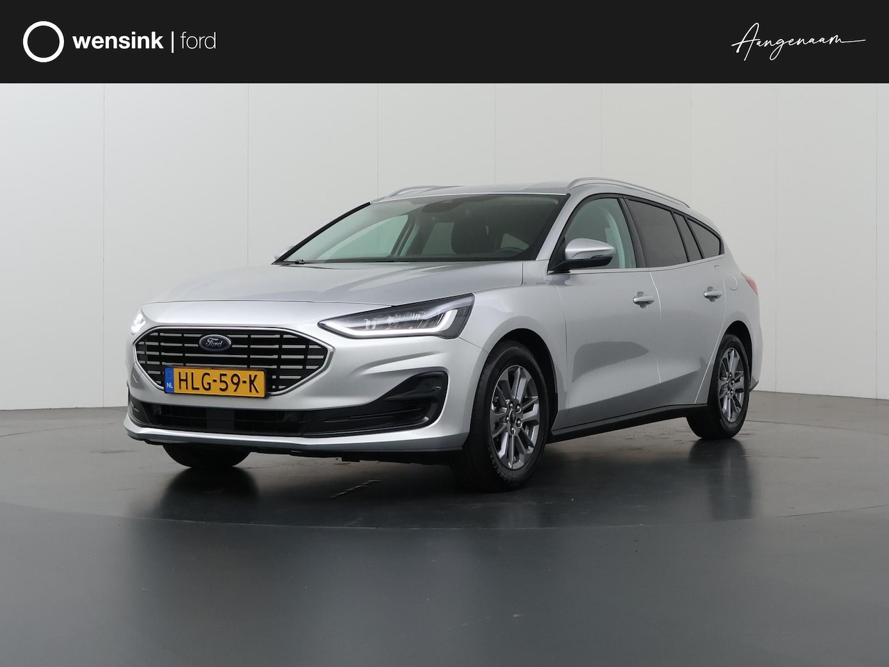 Ford Focus Wagon - 1.0 EcoBoost Hybrid Titanium | Winterpakket | Navigatie | Climate Control | Parkeersensore - AutoWereld.nl