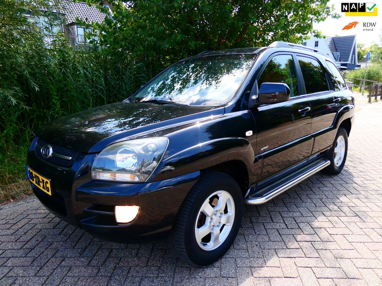 Kia Sportage - 2.7 V6 4WD 176pk Automaat Clima Cruise Leder Trekhaak 1600kg. - AutoWereld.nl
