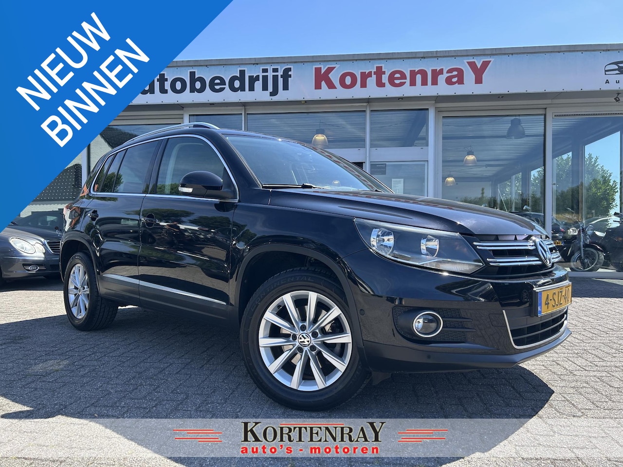 Volkswagen Tiguan - 1.4 TSI Sport&Style /cruise control/airco/trekhaak/100% dealer onderhouden en is in nieuws - AutoWereld.nl