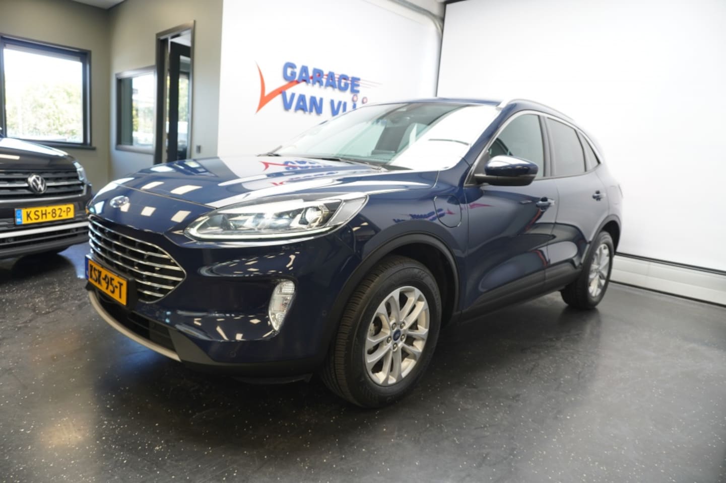 Ford Kuga - 2.5 PHEV Titanium B&O/Camera/HUD/Cruise/Carplay/Leer - AutoWereld.nl