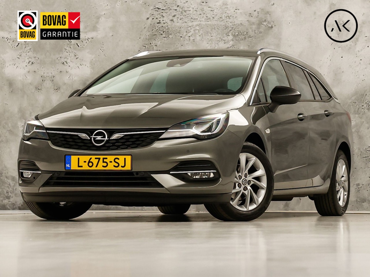 Opel Astra Sports Tourer - 1.2 Business Elegance (GROOT NAVI, APPLE CARPLAY, CRUISE, LANE ASSIST, CAMERA, SPORTSTOELE - AutoWereld.nl