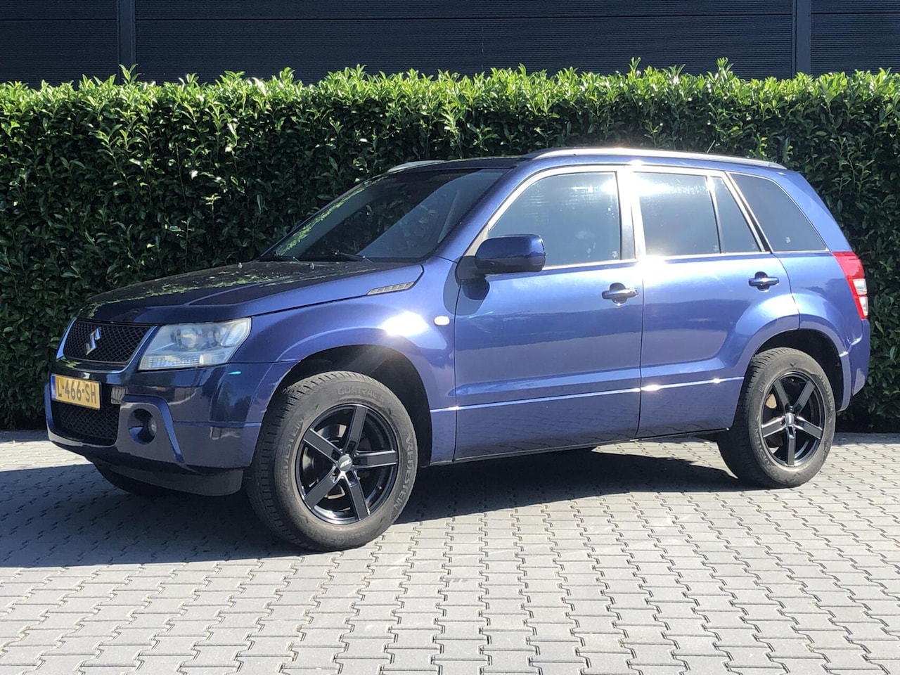 Suzuki Grand Vitara - 2.0-16V High Executive AUTOMAAT, ECC-AIRCO, CARPLAY, CRUISE, LM-VELGEN, 4WD, PDC - AutoWereld.nl