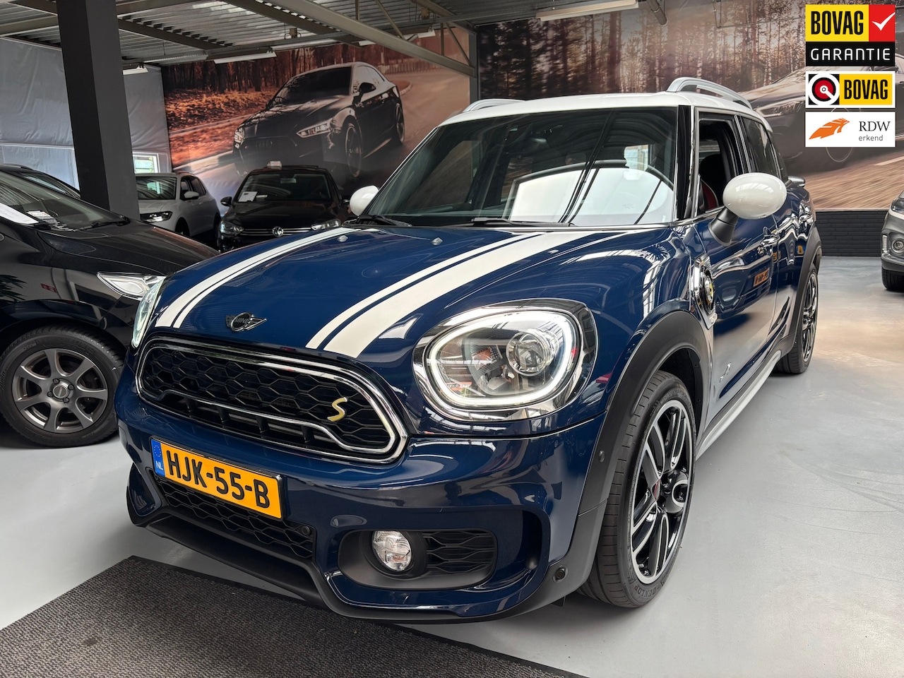 MINI Countryman - 1.5 Cooper S E ALL4 John Works / Camera / Pano / Navi - AutoWereld.nl