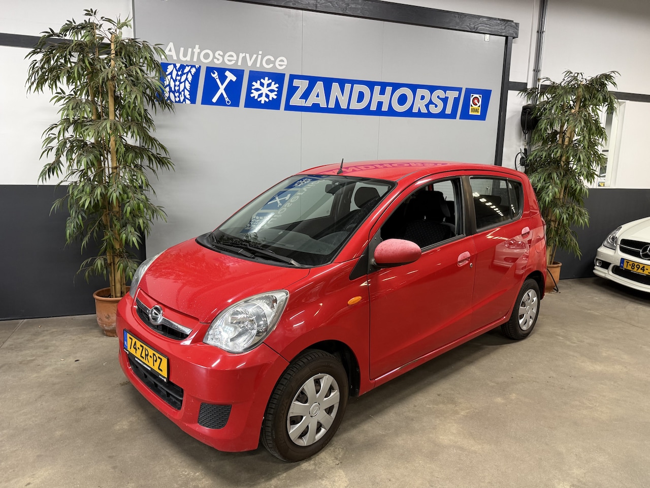 Daihatsu Cuore - 1.0 Premium // APK tot 16-06-2027!!! - AutoWereld.nl