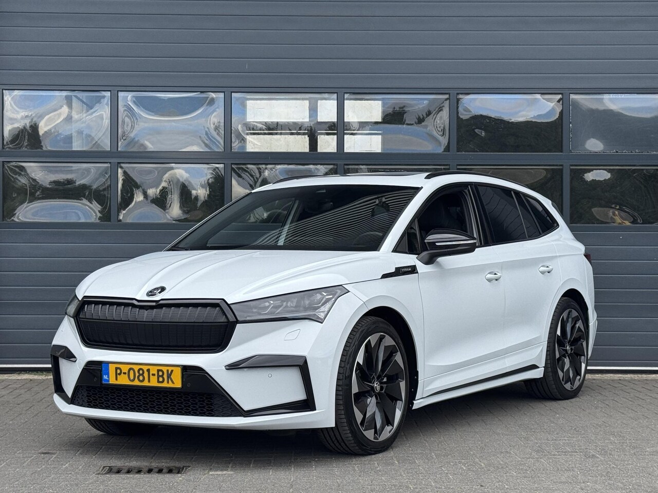 Skoda Enyaq iV - 80 SPORTLINE (92% SOH) I GROOT ACCUPAKKET I WARMTEPOMP I NAVIGATIE I SCHUIF/KANTELDAK - AutoWereld.nl