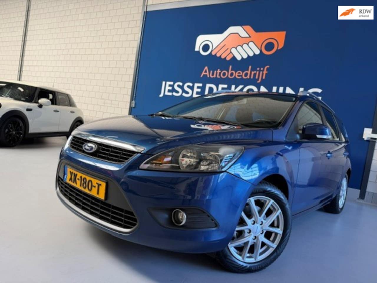 Ford Focus Wagon - 1.8 Limited Flexi Fuel/ bj.2009 / kleur: blauw / airco / sportvelgen / trekhaak / NAP met - AutoWereld.nl