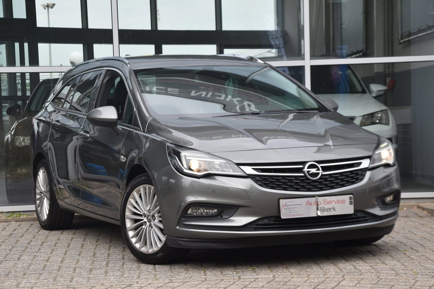Opel Astra Sports Tourer - 1.6 CDTI Innovation Airco Leder Led Nav. Camera Trekhaak - AutoWereld.nl