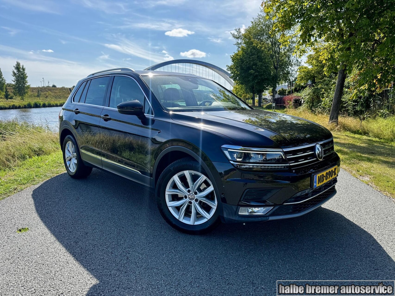Volkswagen Tiguan - 1.4 TSI Highline |Pano|Camera|Stoelv|Carpl - AutoWereld.nl