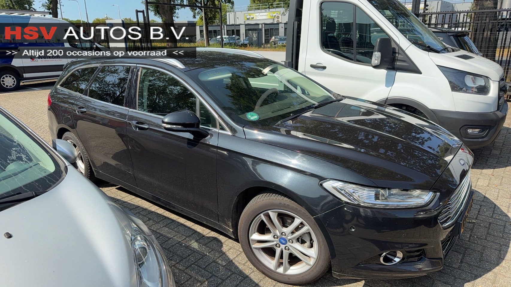 Ford Mondeo Wagon - 1.5 Titanium navigatie 1/2 Leer airco - AutoWereld.nl