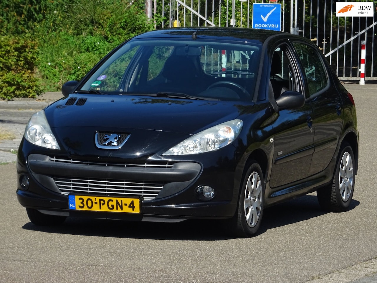 Peugeot 206 - 1.4 Millesim 200 5DEURS BJ2011 NAP/AIRCO/APK - AutoWereld.nl