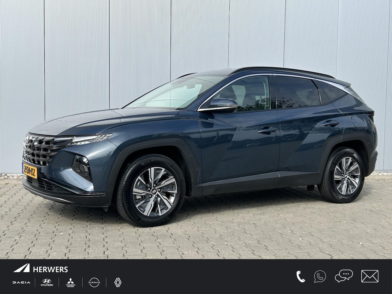 Hyundai Tucson - 1.6 T-GDI HEV Comfort / Nieuwstaat/ Trekhaak Vast 1650KG Trekgewicht / Navigatie / Cruise - AutoWereld.nl
