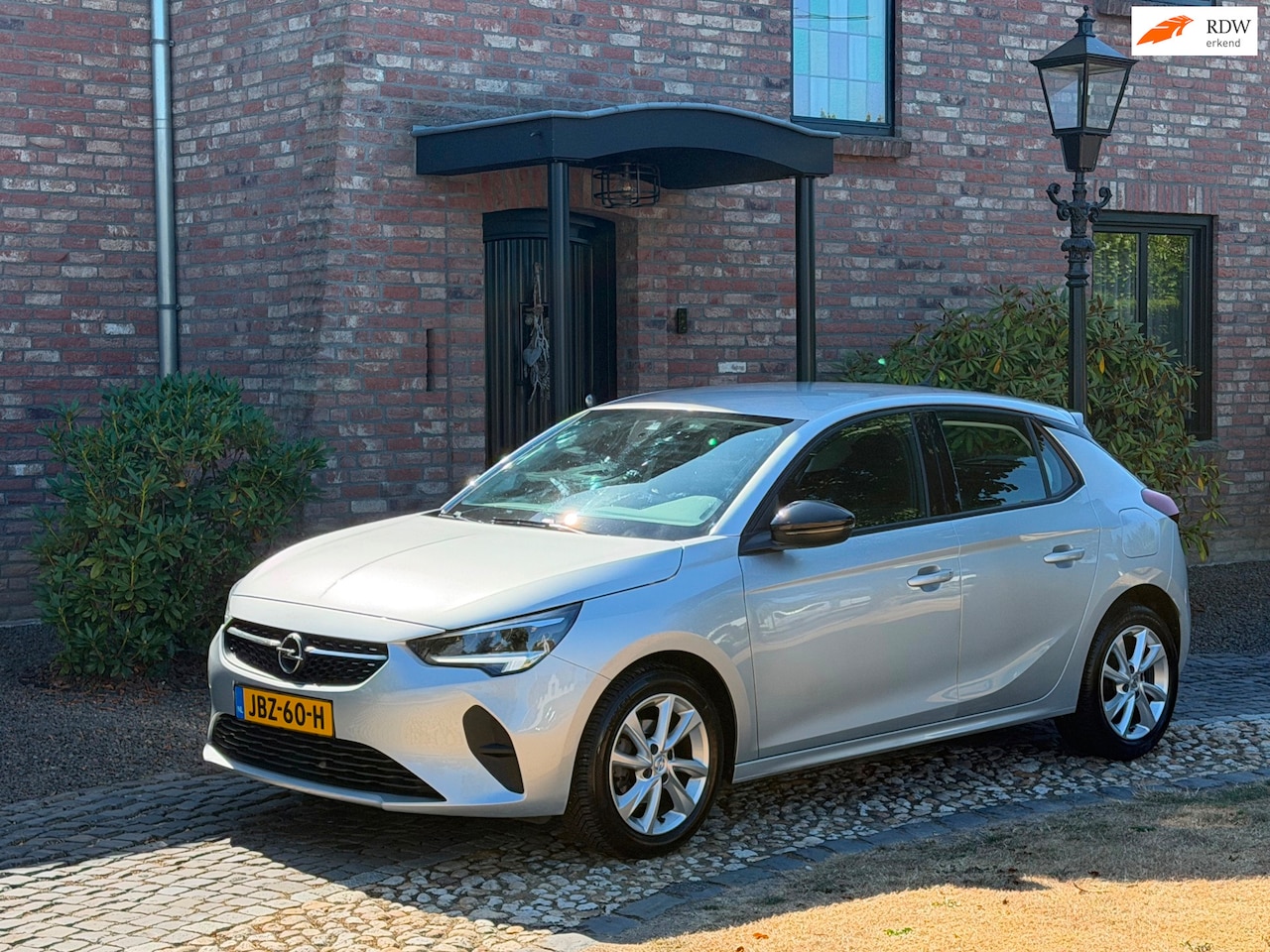 Opel Corsa - 1.2 Edition Airco Cruise Navi 5-deurs - AutoWereld.nl