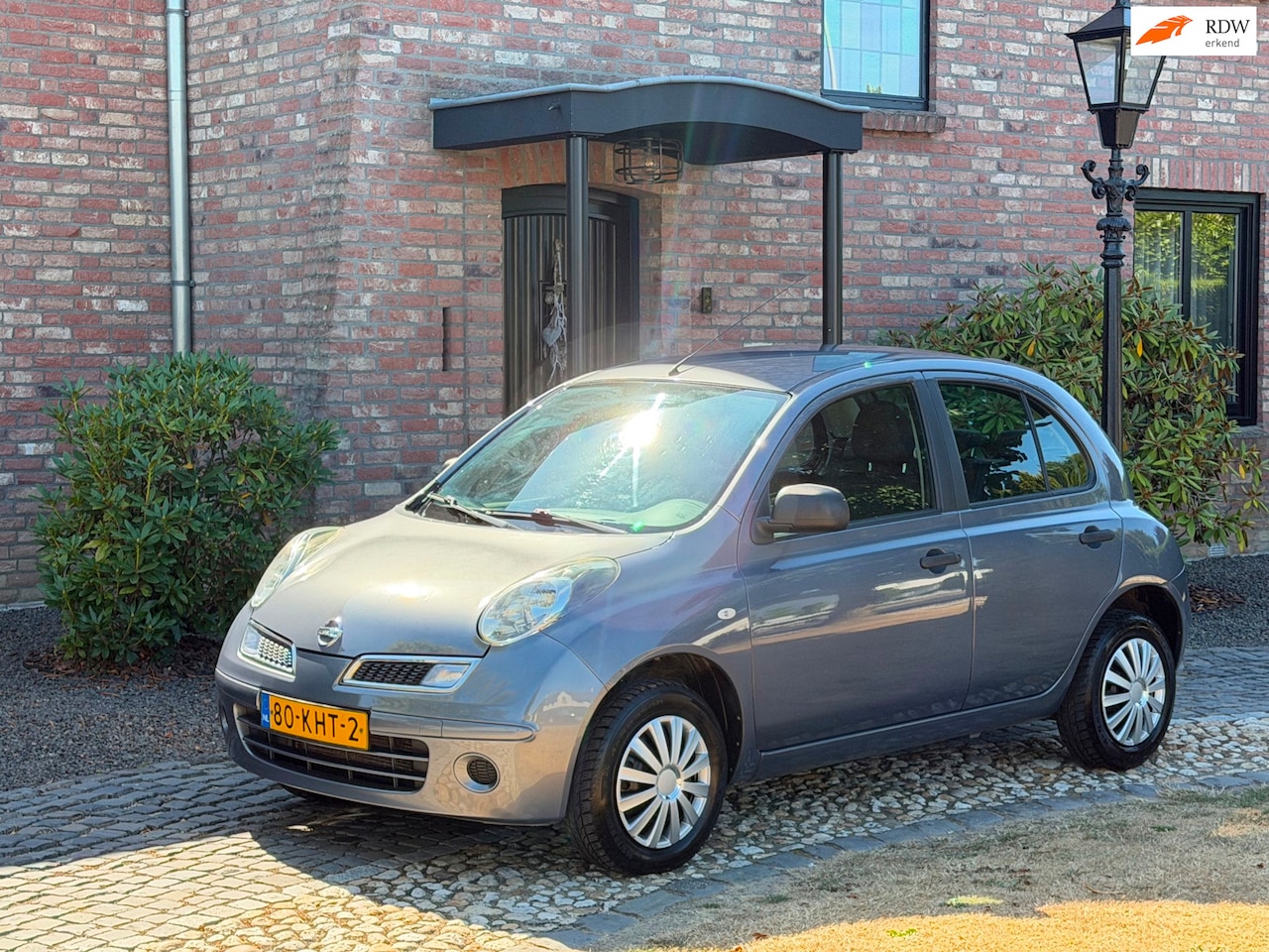 Nissan Micra - 1.2 Mix Pure drive Airco 5-drs - AutoWereld.nl