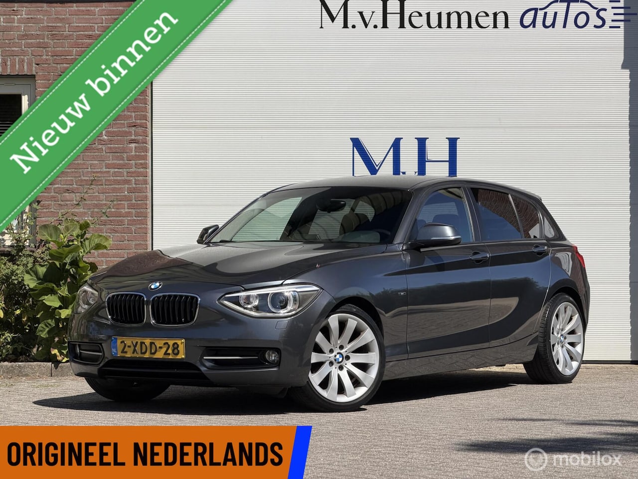 BMW 1-serie - 114i Sport High Executive Sportstoelen Trekhaak Climate - AutoWereld.nl