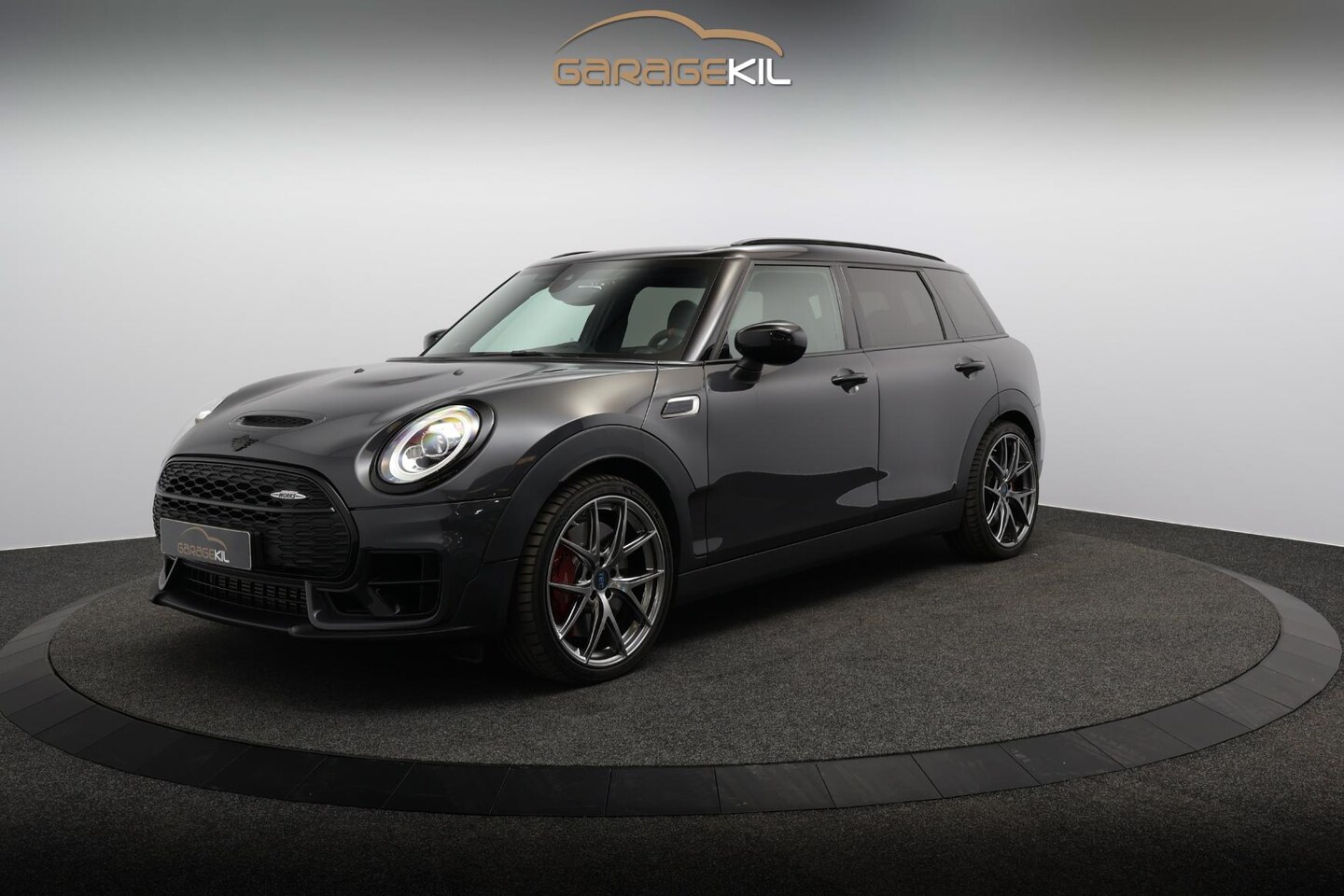 MINI Clubman - 2.0 JCW ALL4 Chili Dealeronderh. / 306pk! / Harman Kardon / Comfort Acces / Panoramadak / - AutoWereld.nl